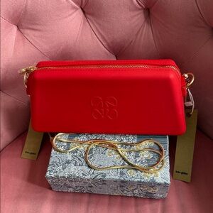 Elegant Red Clutch with Gold Accents